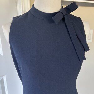 Maggy London midi dress size 0. Excellent condition. Sleek dress adorable bow